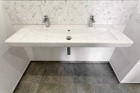 sink and faucet in the interior of a modern bathroomの写真素材