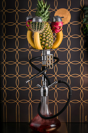 modern hookah with fruit bowl on the tableの写真素材