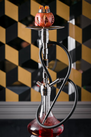 modern hookah with fruit bowl on the tableの写真素材