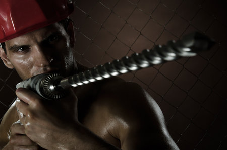  the beauty worker driller man  close up,   wield with  perforator