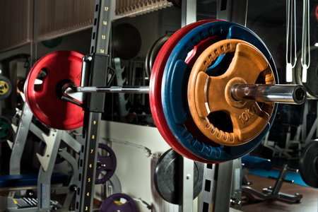 weight in dark weight room, horizontal photoの写真素材