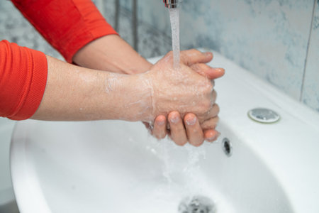 Man washes hands with soap, concept coronavirus covid-19 epidemicの写真素材