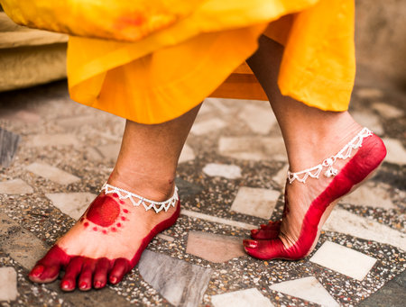 Alta design on feet of girl for hindu Indian wedding ceremonyの写真素材