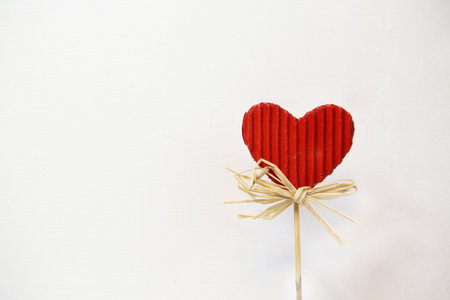 Valentine greeting with red paper heart and place for your textの写真素材