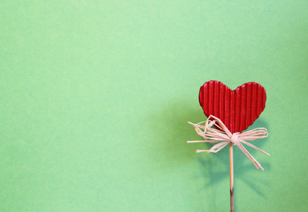 Valentine greeting with red paper heart and place for your textの写真素材