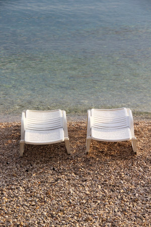 Clear sea water of Adriatic sea and blue summer  shoes, Croatiaの写真素材