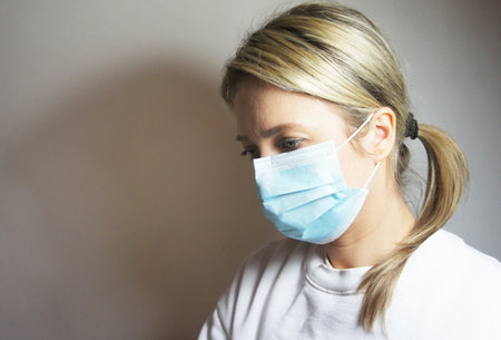 Coronavirus pandemia 2019 and beautiful woman in mask