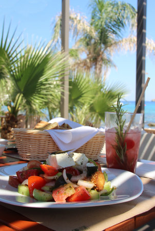 Beautiful dinner on the seacoast in Greeceの写真素材