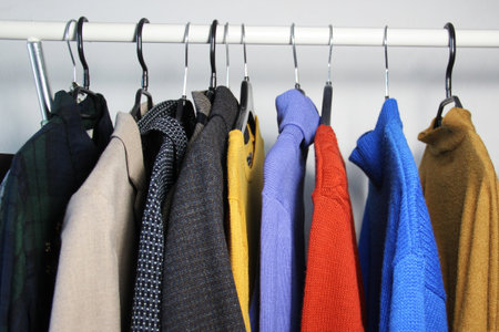 Mix of vivid multicolored knitwear in the dressing roomの写真素材