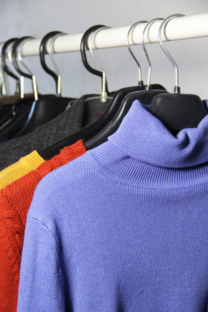 Mix of vivid multicolored knitwear in the dressing roomの写真素材