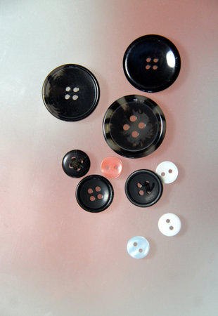 Mix of buttons in different sizes on the tableの写真素材