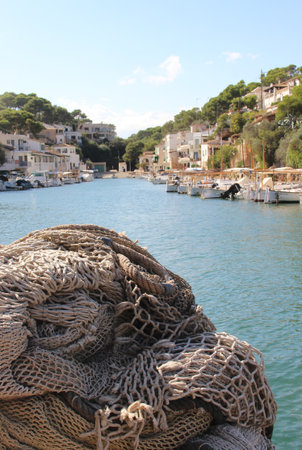 Beautiful view of Cala Figuera and fishing nets, Mallorcaの写真素材