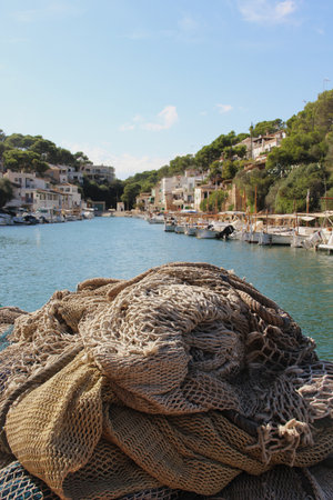 Beautiful view of Cala Figuera and fishing nets, Mallorcaの写真素材