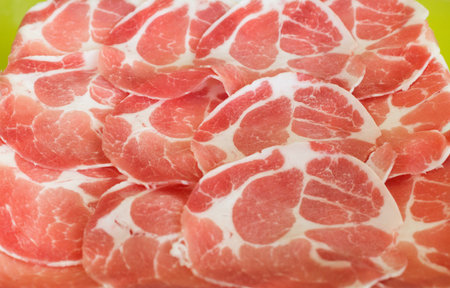 sliced pork on plateの写真素材