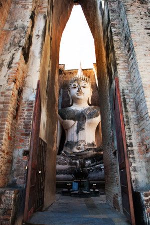 An Ancient Big Buddha statue at Sukhothai Historical Park,Thailandの写真素材