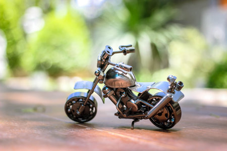 Steel chopper motorbike model with blur outdoor background.の写真素材