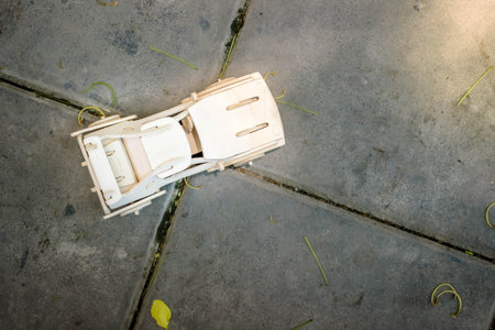 Top view of Wooden car model on cement floor.の写真素材