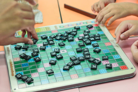 CHONBURI, THAILAND - AUGUST 28, 2017: Student playing scrabble cross word in school.のeditorial素材