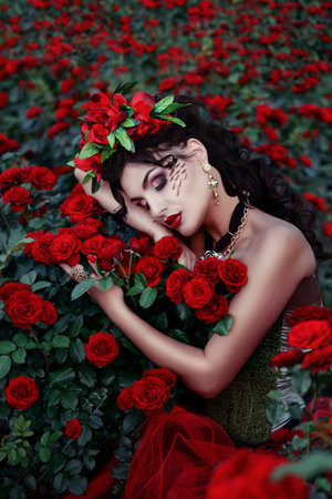 Art portrait of a girl brunette on a background of rosesの写真素材