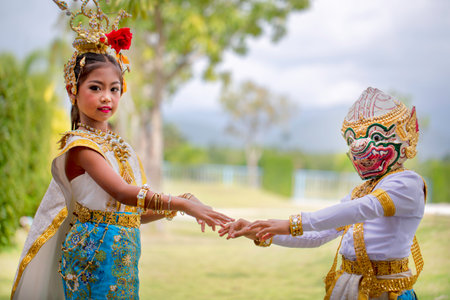 Thai girl dressed in khon dress, Thai classical dance show.