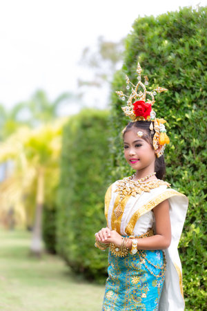 Thai girl dressed in khon dress, Thai classical dance show.の写真素材