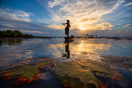 A view of the lake in the morning at Pakpra, Phatthalung, Thailand and the fisherman's way of life...