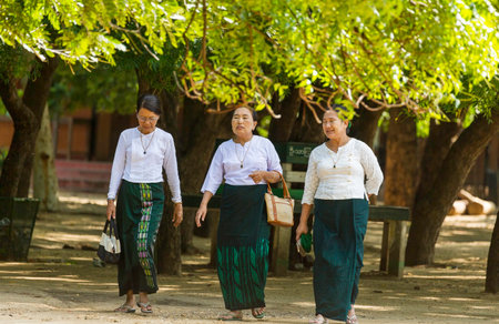Bagan/Myanmar-October 5th 2019: Burmese elderly women wear Burmese traditional woven clothes, which are polite suits to wear on important occasions.のeditorial素材