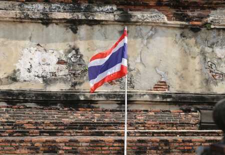 Thailand flag on the background of an old wall の写真素材