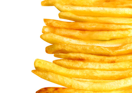 Tasty fries is photographed on a white background closeupの写真素材