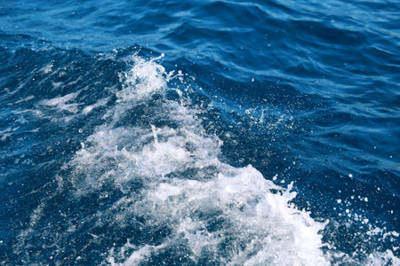 photo of a bright blue ocean waveの写真素材