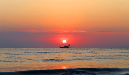 Photos bright wonderful sunset at the seasideの写真素材
