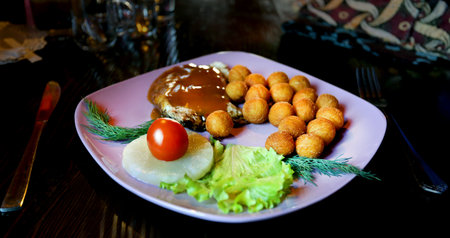 Photo dish of potatoes and chickenの写真素材