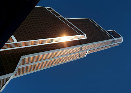 Photo of a modern bright tower of a skyscraper