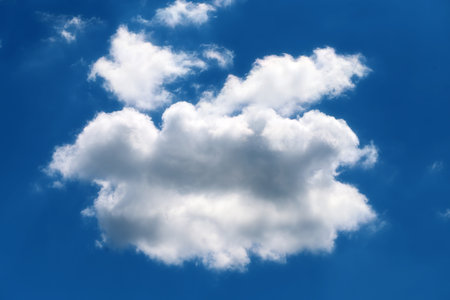Photo of a sunlit cloud in the skyの写真素材