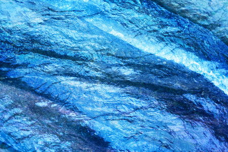 Photo of a macro texture of a bright water sunlit textureの写真素材