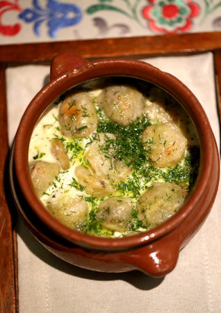Photo of a macro of delicious dumplings in a pot Russian dishの写真素材