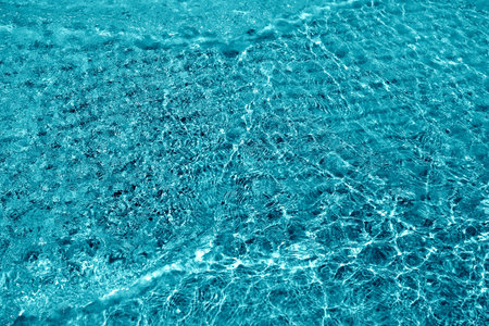 Photo of a macro background of blue sea wavesの写真素材