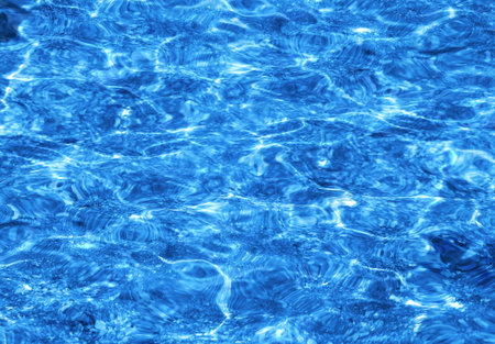 Photo macro nature background Blue transparent water with waves