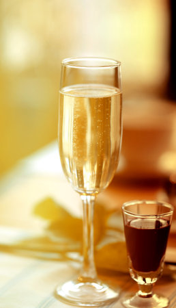 Fine macro photo of champagne glass in a restaurant for a holidayの写真素材