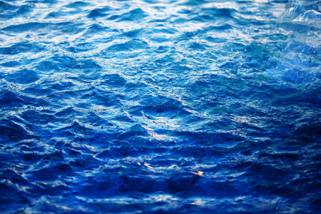 Macro photo background with transparent blue waves of seaの写真素材