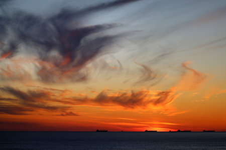 Beautiful photo of a bright sunset on the sea on a summer day