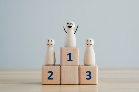 Wooden human with happy face standing on podium ranking for winner business and sport competition. Human resource, Talent management, Recruitment employee, Successful business team leader concept.の写真素材