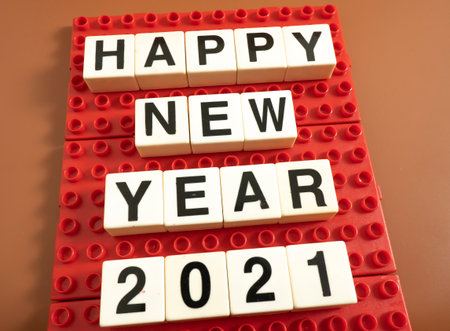 Selective focus of a text happy new year 2021. Text happy new year 2021 place on a plactic block.の写真素材