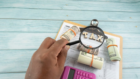 Tax-filling concept  featuring half of U.S IRS 1040 form.の写真素材