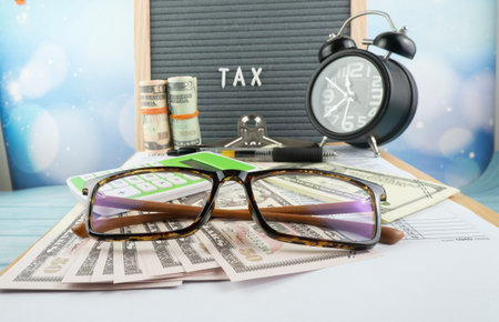Tax-filling concept  featuring half of U.S IRS 1040 form.の写真素材