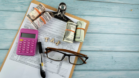 Tax-filling concept  featuring half of U.S IRS 1040 form.の写真素材