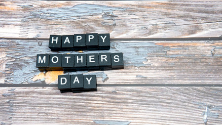 Selective foucs of an alphabet that quote Love Mother for Mother's day.の写真素材
