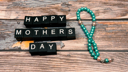 Selective foucs of an alphabet that quote Love Mother for Mother's day.の写真素材