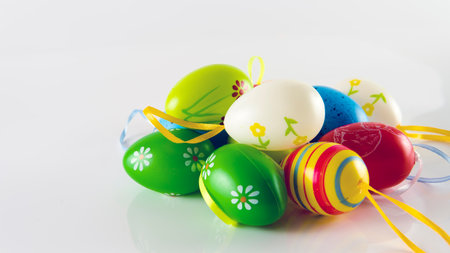 Selective focus of an easter egg decoration isolated on white background. Easter eggs, also called...