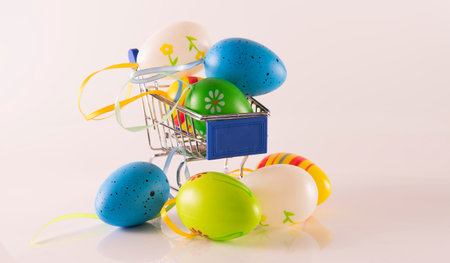 Selective focus of an easter egg decoration on a shopping cart. Easter eggs, also called Paschal eggs, and Egg of Easter are eggs that are sometimes decorated. cor fetival or celebrationの写真素材